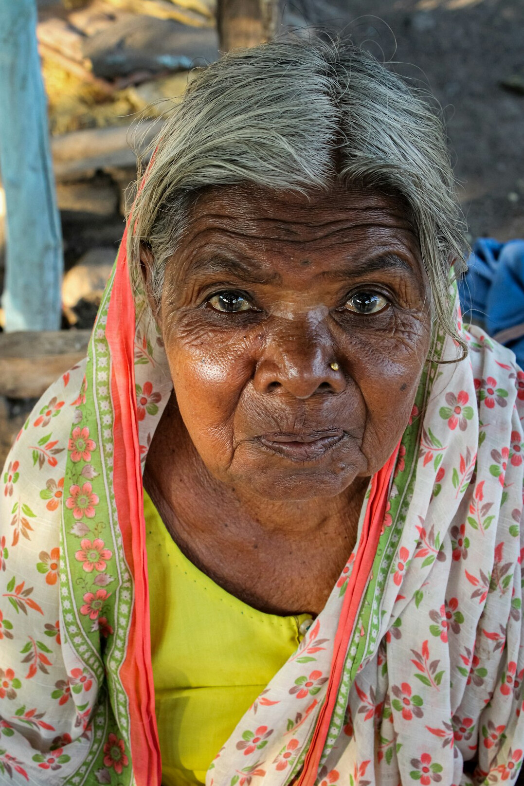Portrait of a smiling senior woman with short grey hair