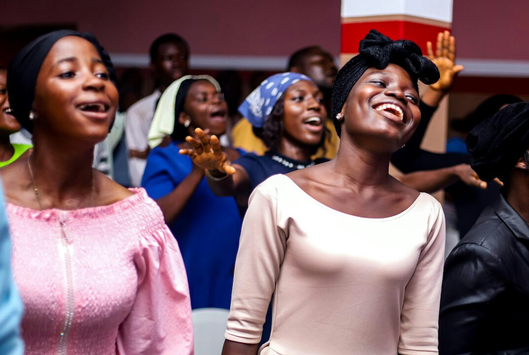 Senior choir group singing together with joyful expressions