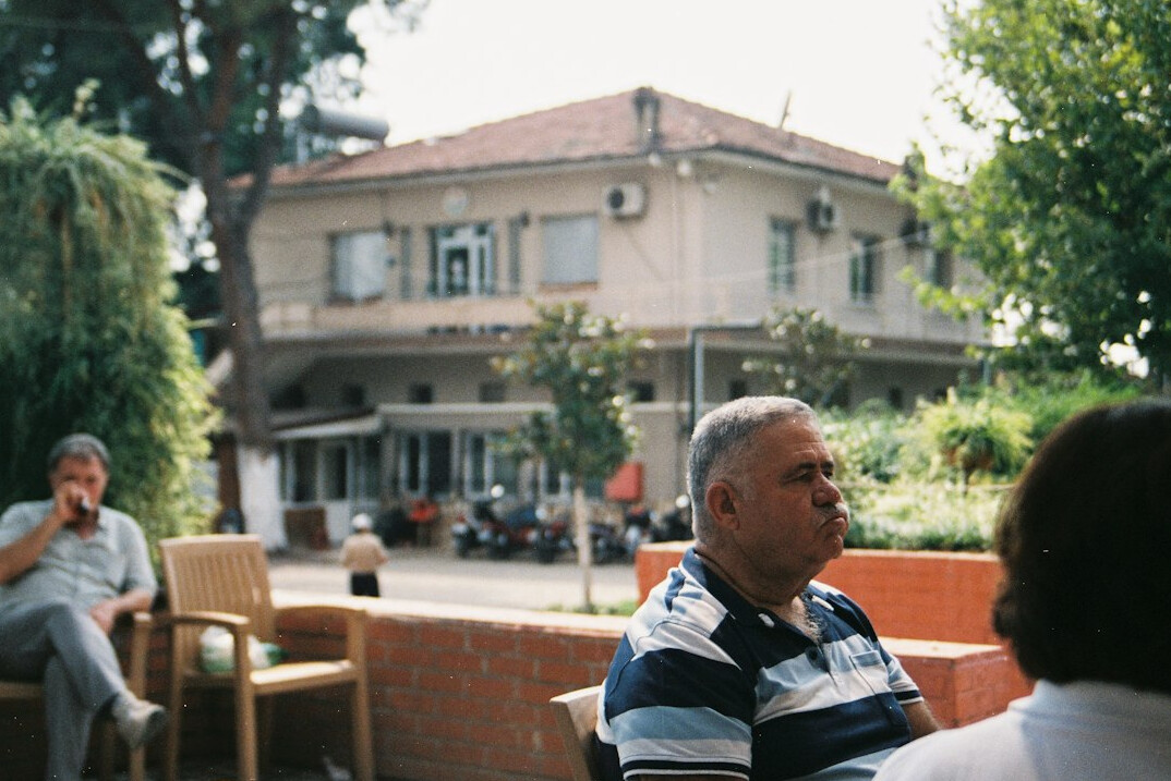 senior people chatting outdoors