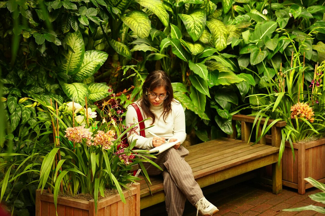 senior woman reading in peaceful garden