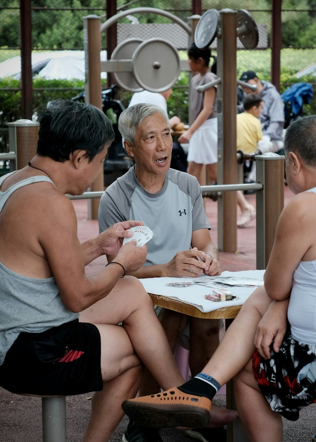 group of seniors playing cards